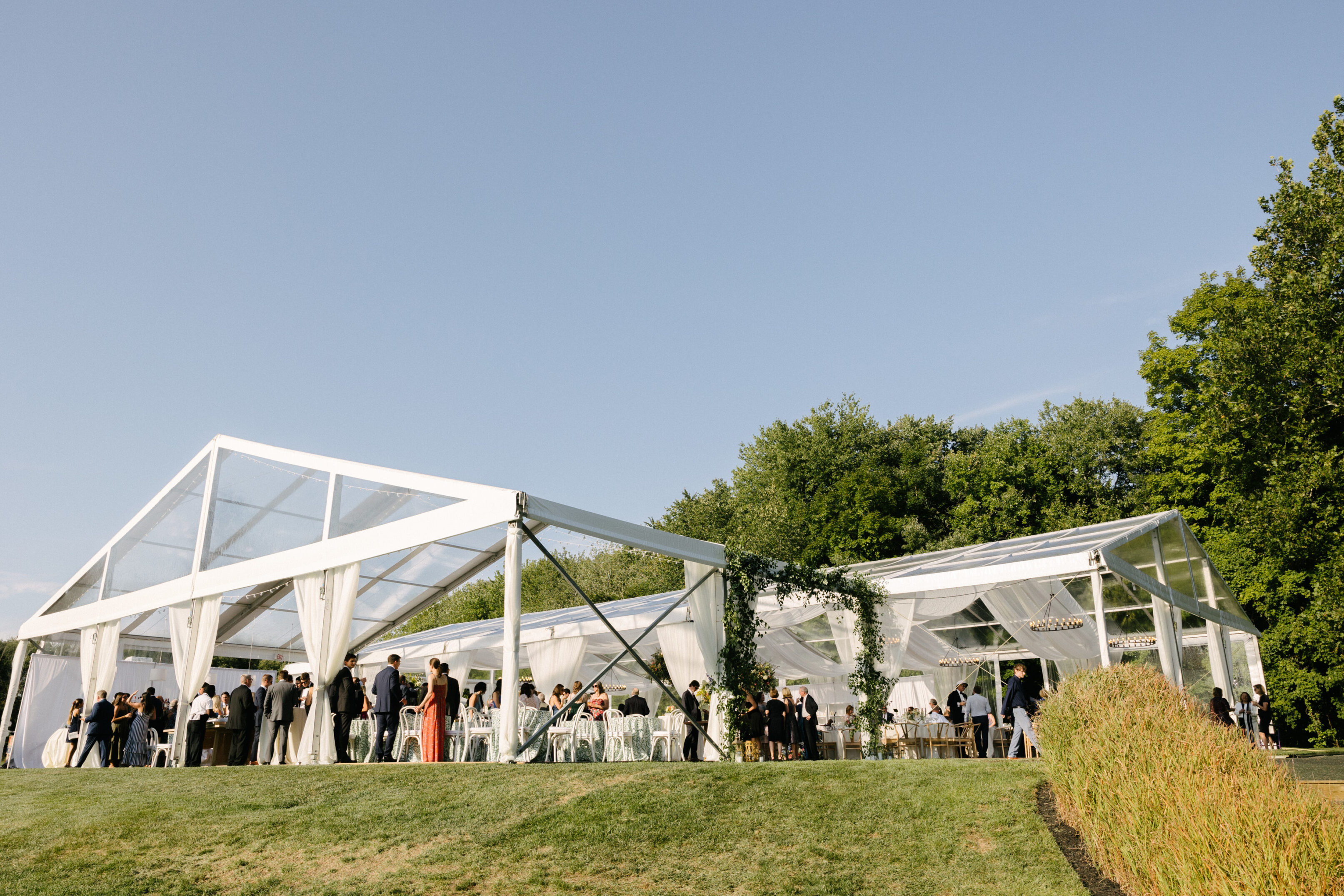 Luxury wedding tent rental for country club venue. Connecticut country club wedding with sailcloth tent.