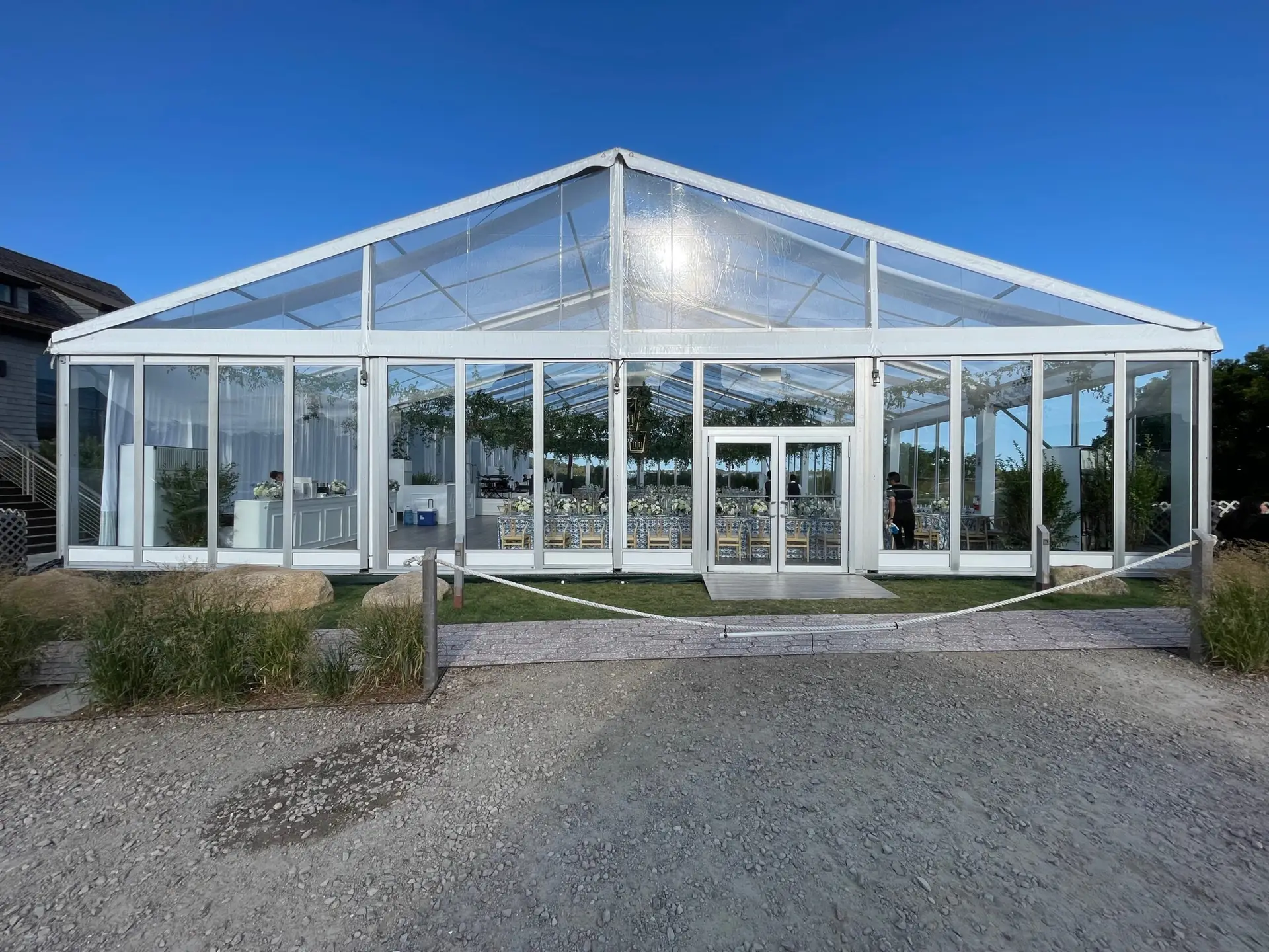 Clearspan Losberger Structure with glass walls and doors for luxury private outdoor event in Rhode Island.