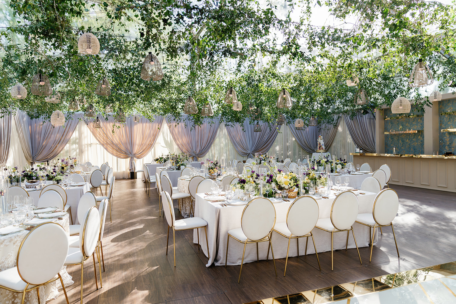 Elegant wedding reception with greenery decor