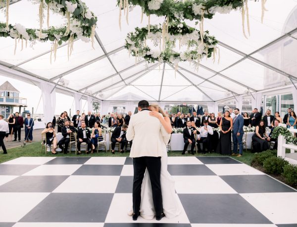 bistro lighting and drapery for clear top wedding reception tent