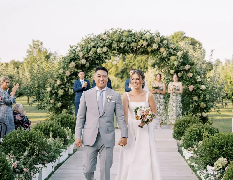 Sailcloth wedding tent in apple orchard