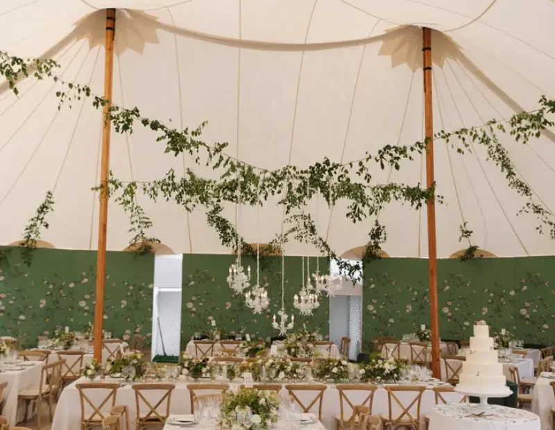 A luxury sailcloth tented wedding at Ocean House in Watch Hill, Rhode Island. See how Greenwich Tent brought elegant coastal charm to this stunning seaside celebration